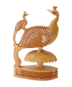 Hand-carved wooden peacock sculpture with intricate lattice work on a natural wood base.