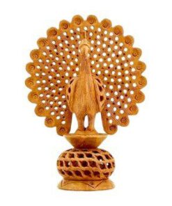 Handcrafted wooden peacock sculpture in Kadam wood with intricate feather detailing and natural finish.