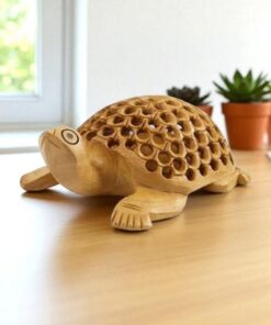 Handcrafted wooden turtle sculpture with carved shell, eco-friendly design, ideal for home decor.