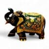 Hand-painted black wooden elephant statue with Indian floral designs and raised trunk.