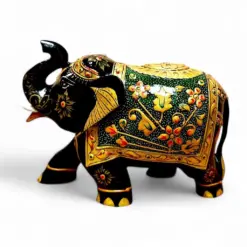 Hand-painted black wooden elephant statue with Indian floral designs and raised trunk.