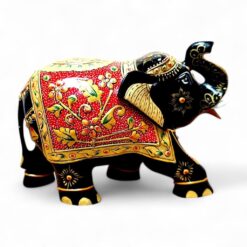 Hand-painted black Indian elephant figurine with decorative gold and red details.