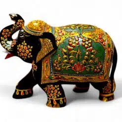 Hand-painted Indian decorative elephant figurine with raised trunk and ornate gold details.