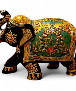 Hand-painted Indian decorative elephant figurine with raised trunk and ornate gold details.