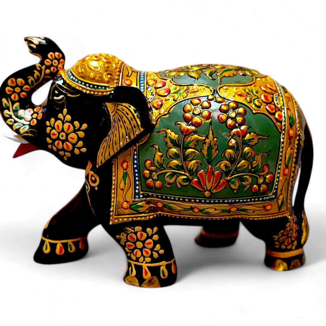 Hand-painted Indian decorative elephant figurine with raised trunk and ornate gold details.