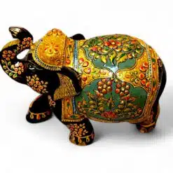 Hand-painted Indian folk art elephant figurine with ornate gold floral details.