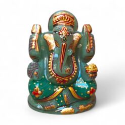 Natural Stone Zade Lord Ganesha statue with gold crown and red floral details.