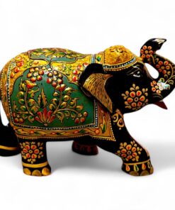 Ornate hand-painted Indian elephant statue with gold, green, and red ceremonial details.