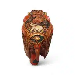 Ornate handcrafted Indian elephant figurine with colorful gold floral patterns.