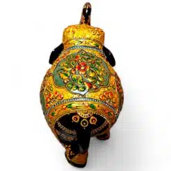 Ornate hand-painted elephant figurine with gold floral patterns and raised trunk.