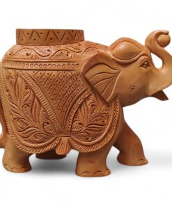 Carved wooden Indian tample piller elephant figurine with raised trunk and floral patterns.