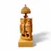 Hand-carved wooden ceremonial elephant statue with ornate canopy and pedestal.