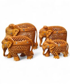 Handcrafted wooden elephant figurine family with intricate Indian carved decor.