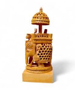Hand-carved wooden elephant figurine with ornate royal canopy and decorative base.