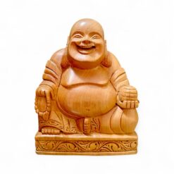 Carved wooden laughing Buddha statue with big belly on ornate base.