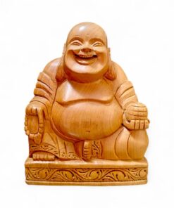 Carved wooden laughing Buddha statue with big belly on ornate base.