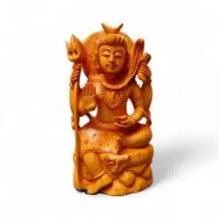 Hand-carved wooden Lord Shiva statue with trident, serpent, and blessing gesture.