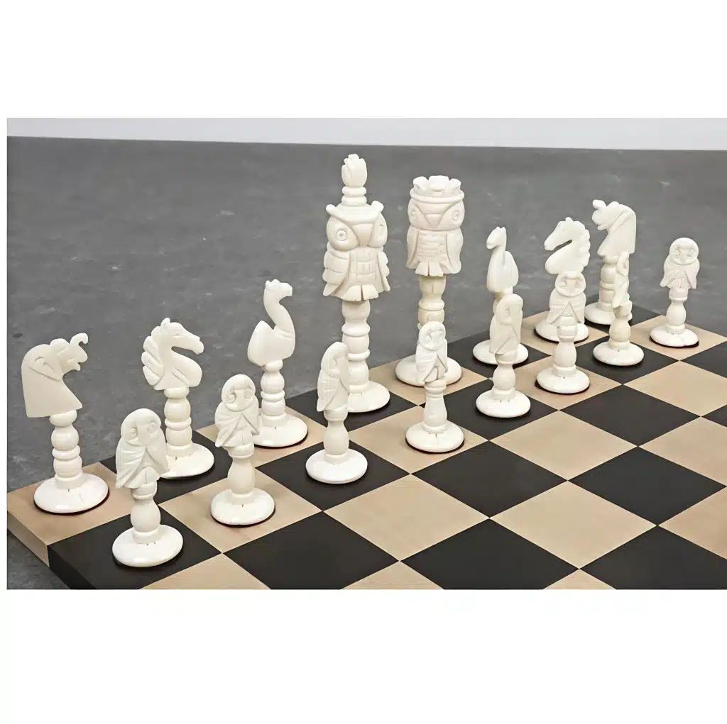 Camel bone chess pieces on modern wooden chessboard.