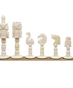 Hand-carved bone chess set with animal-shaped bone pieces on wooden base.