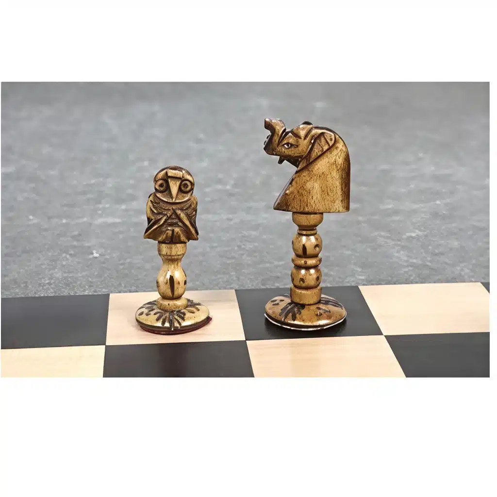Handcrafted wooden owl and knight chess pieces on a classic chessboard.